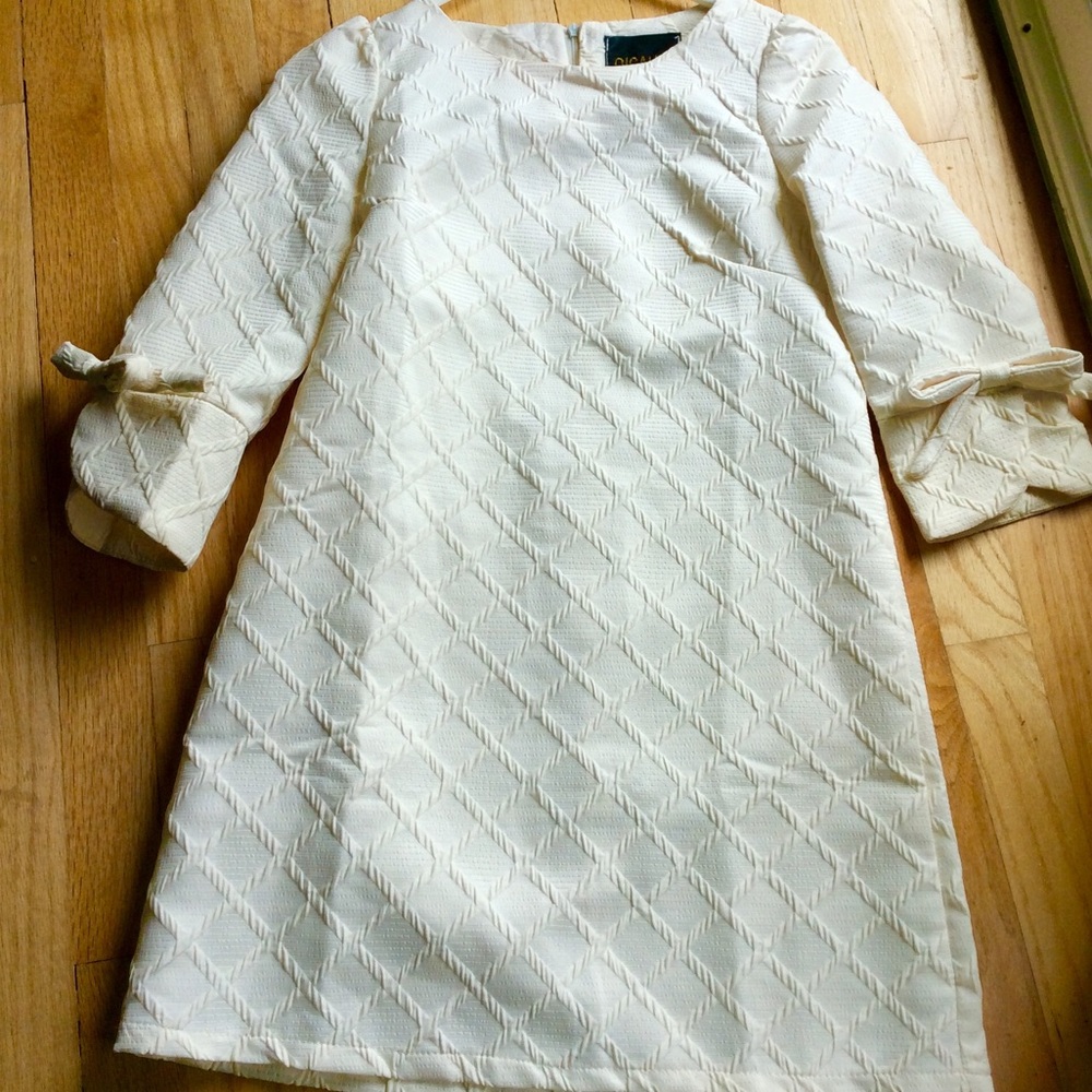 Cream textured shift dress with bow sleeves NWOT